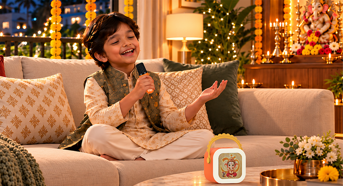 A child singing along with the Bhakti StoryBox karaoke mic