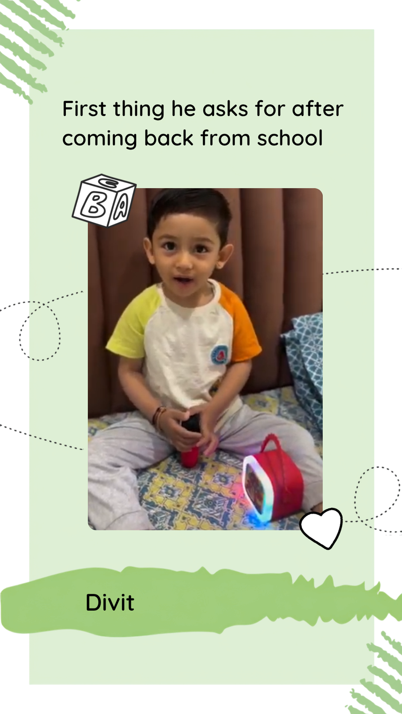 A boy singing along with the karaoke mic